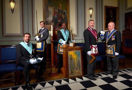 Freemasons participating in charitable community service